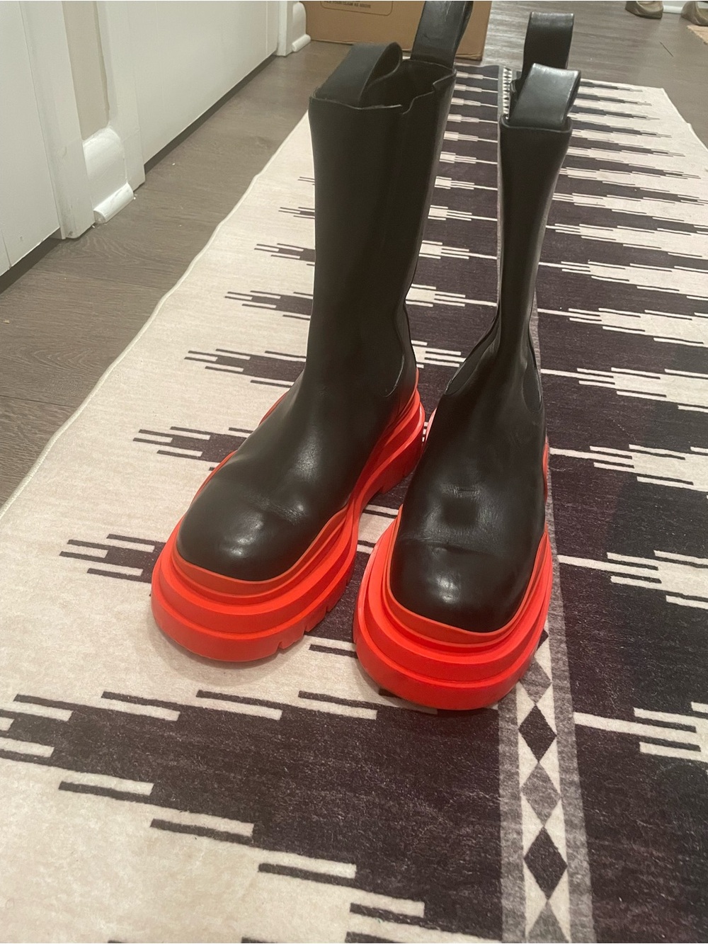Bottega Veneta Black Leather Boots with Red Platform Soles
